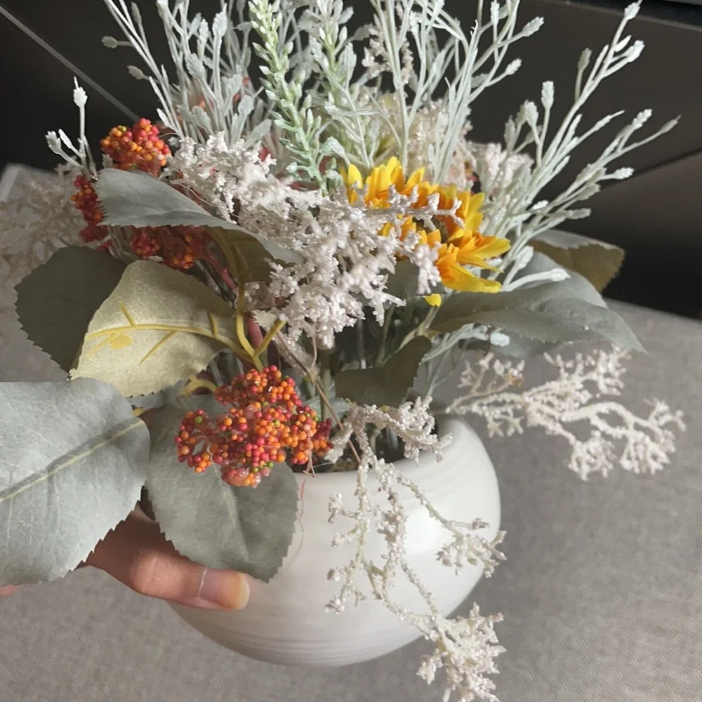 Dried faux flowers‎ in white squat pot decor